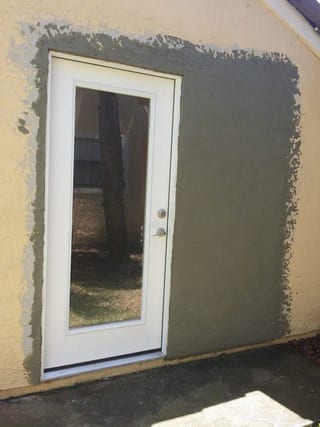 Same yellow wall with fresh scratch coat over the patch ready for finish